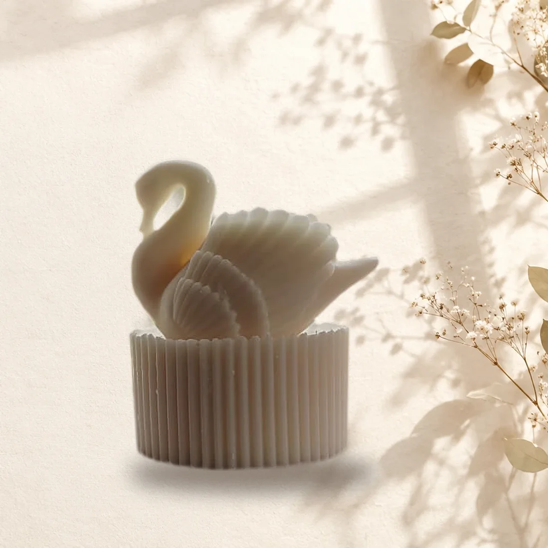 Home Handmade ivory swan candle with a ribbed base